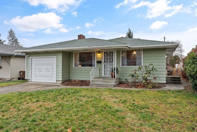 ranch-style house with a garage and a front yard