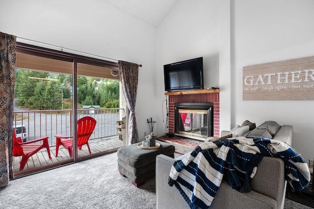 carpeted living room featuring a brick fireplace and lofted ceiling