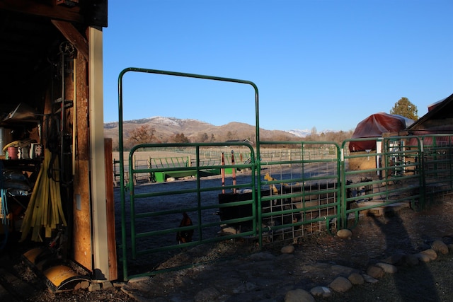 exterior space featuring a mountain view and a rural view