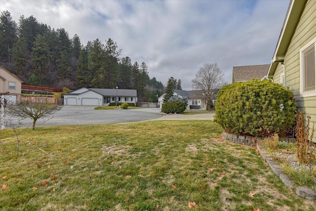 view of yard featuring a garage