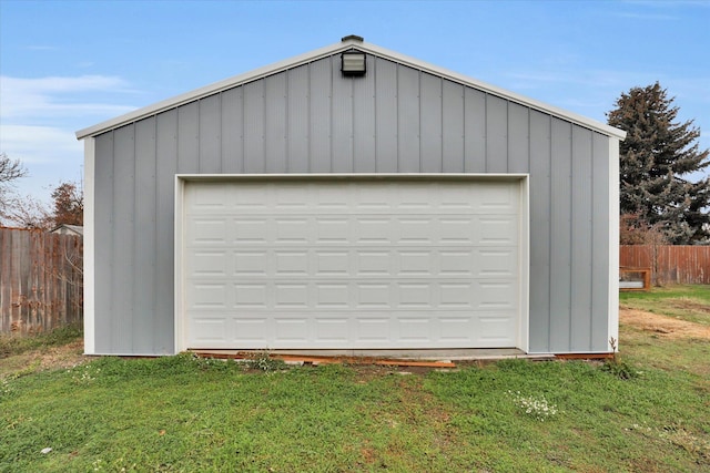 garage with a yard