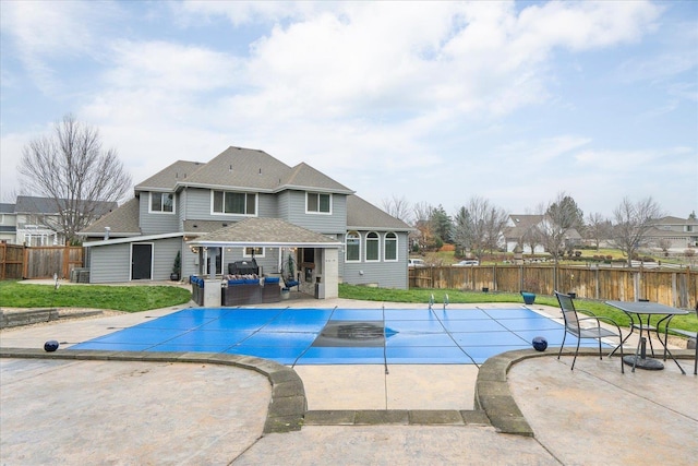 view of pool featuring an outdoor living space and a patio