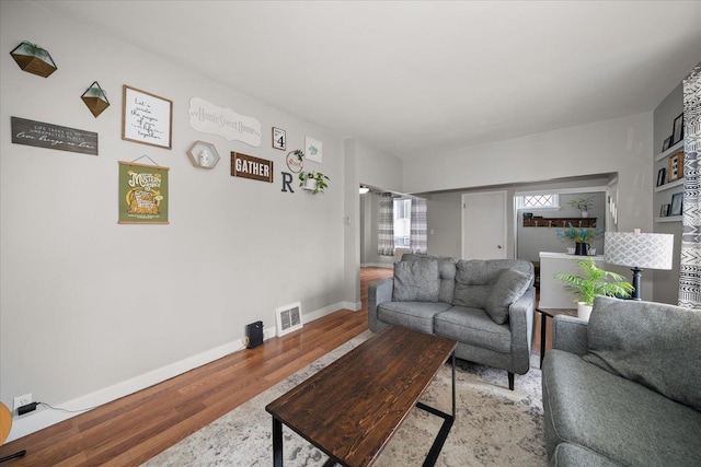 living room featuring hardwood / wood-style flooring