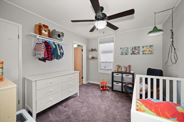 bedroom featuring dark colored carpet, ceiling fan, and ornamental molding