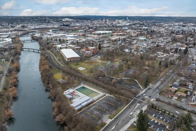 birds eye view of property featuring a water view