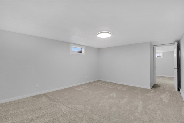 basement with light colored carpet