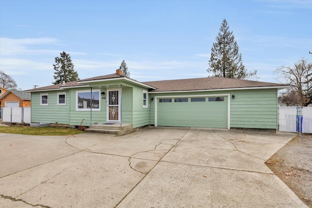 ranch-style house featuring a garage