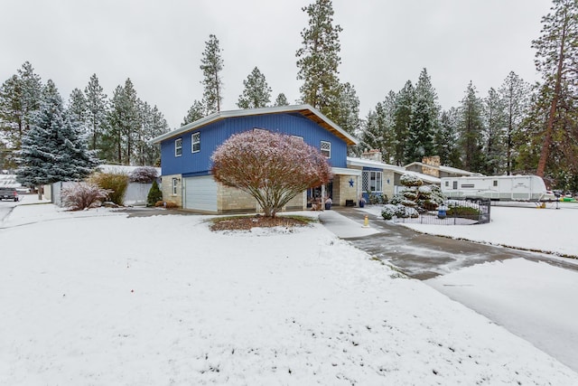 view of front of property with a garage