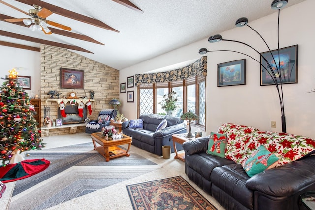 living room featuring carpet flooring, ceiling fan, a textured ceiling, vaulted ceiling, and a fireplace