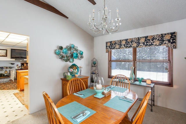 dining area featuring lofted ceiling, light carpet, a textured ceiling, and an inviting chandelier