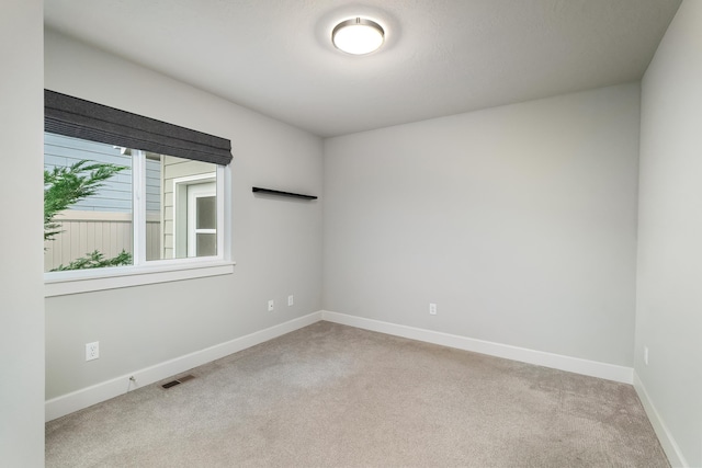 view of carpeted spare room