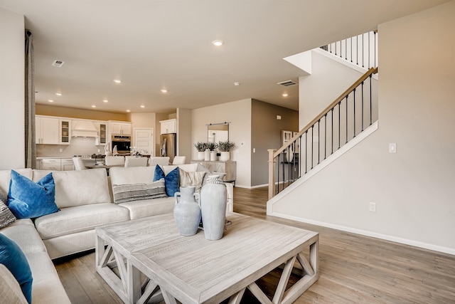 living room featuring light hardwood / wood-style floors