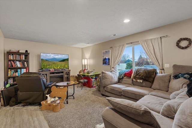 living room featuring light carpet