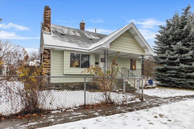 bungalow-style house featuring covered porch