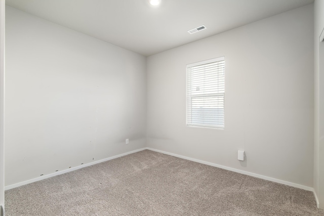 unfurnished room with carpet floors