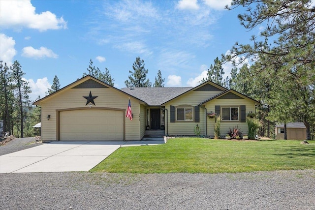 view of front facade featuring a front yard and a garage