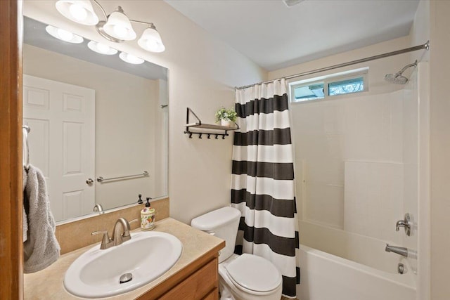 full bathroom with shower / bath combination with curtain, vanity, and toilet