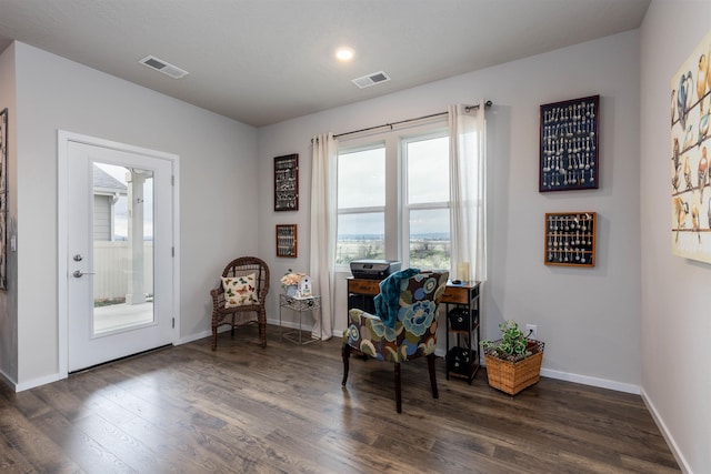 living area featuring dark hardwood / wood-style floors