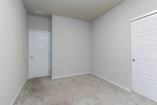 empty room with light carpet