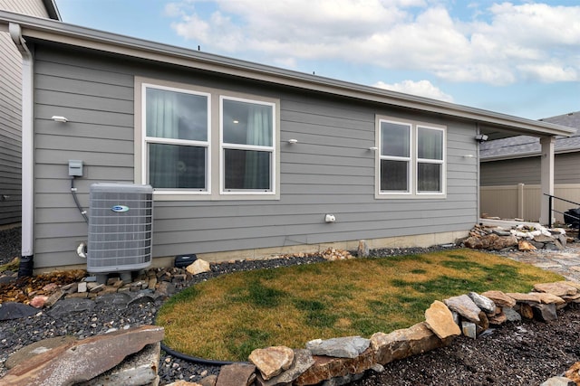 view of property exterior featuring central air condition unit