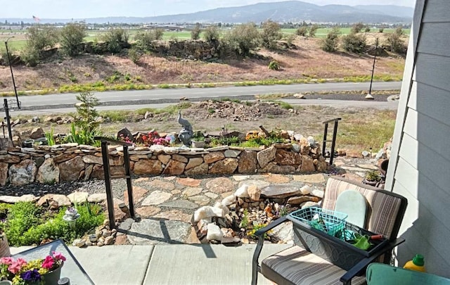 view of patio with a mountain view