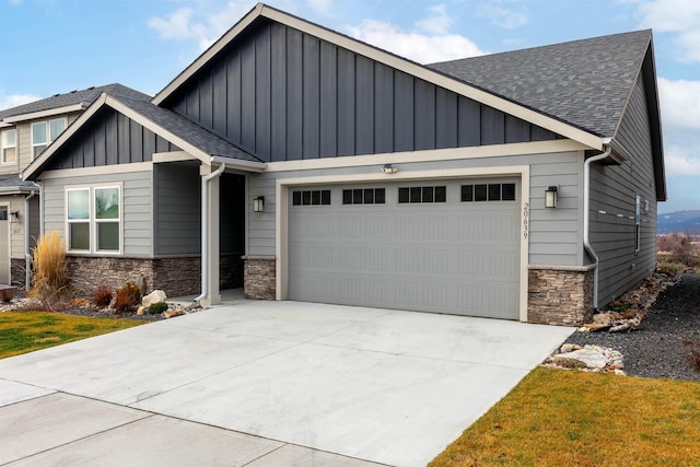 craftsman-style home featuring a garage