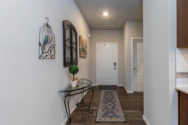 doorway featuring dark hardwood / wood-style floors