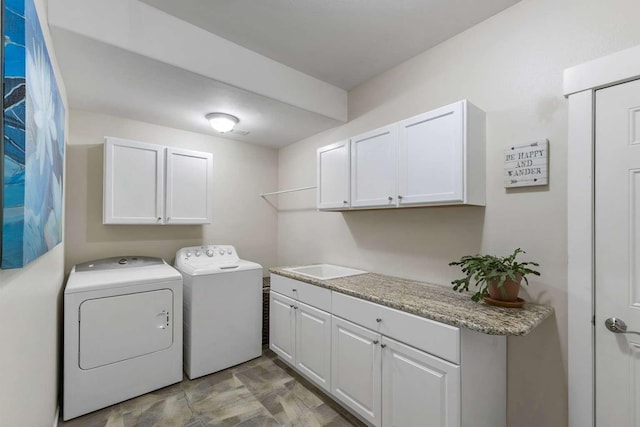12507 N Cherokee Dr, Newman Lake, WA 99025 - laundry area featuring separate washer and dryer and cabinet space
