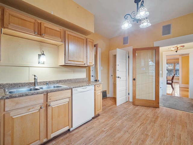 kitchen featuring dishwasher, sink, light hardwood / wood-style flooring, pendant lighting, and light brown cabinetry