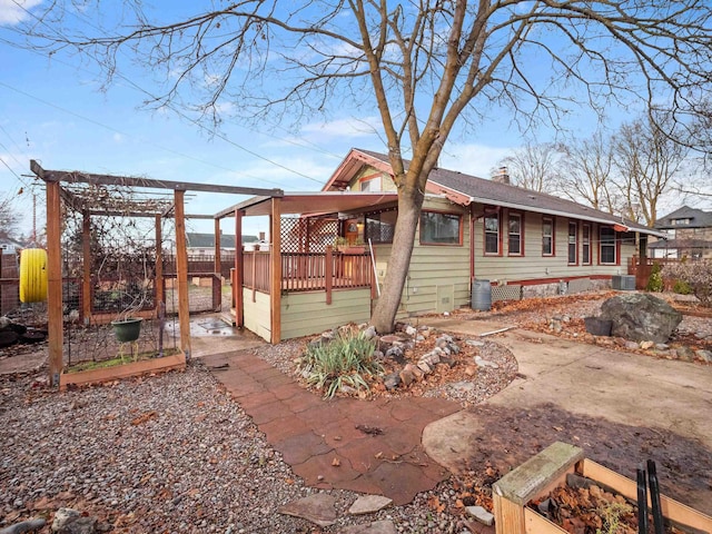 exterior space featuring a wooden deck