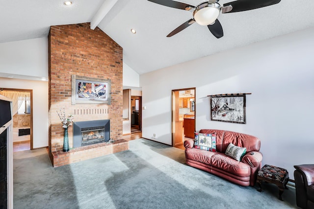 carpeted living room featuring a fireplace, beam ceiling, high vaulted ceiling, and ceiling fan