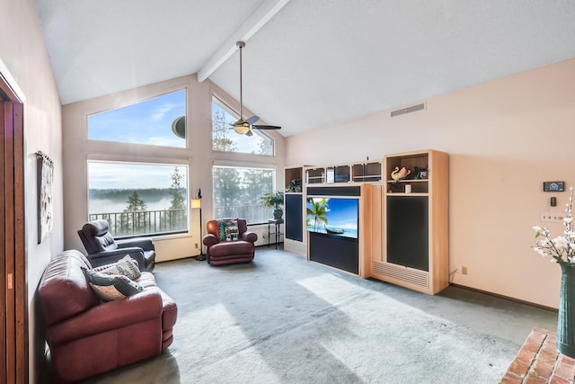 carpeted living room featuring ceiling fan, beam ceiling, and high vaulted ceiling