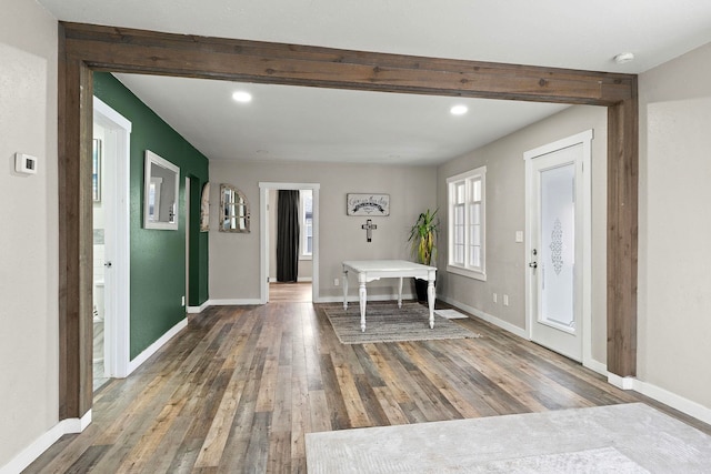 entrance foyer featuring dark hardwood / wood-style flooring