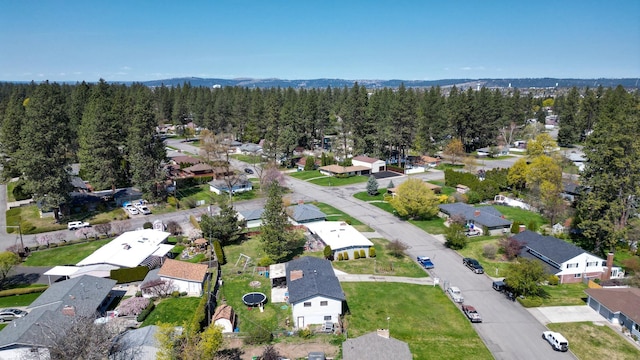 aerial view with a forest view and a residential view