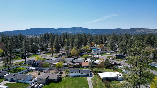 bird's eye view with a residential view, a forest view, and a mountain view