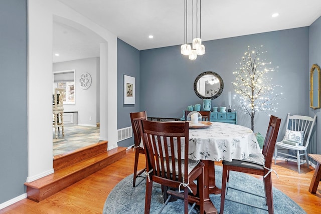 dining room featuring hardwood / wood-style flooring