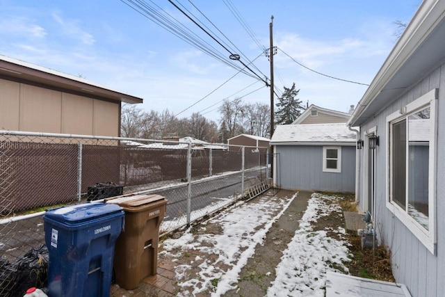 view of yard layered in snow