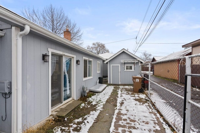 exterior space with a shed