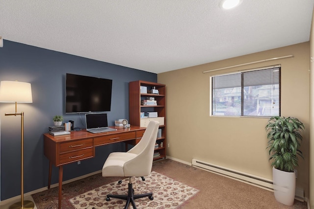 carpeted home office with baseboard heating and a textured ceiling