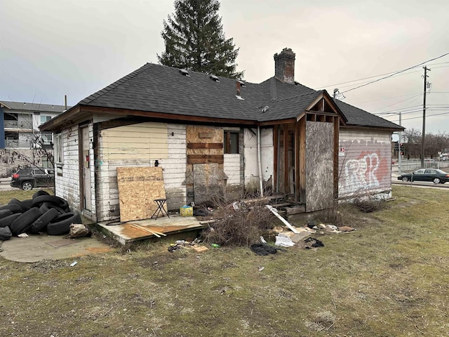 2803 N Hamilton St, Spokane, WA 99207 - back of house featuring a chimney and roof with shingles