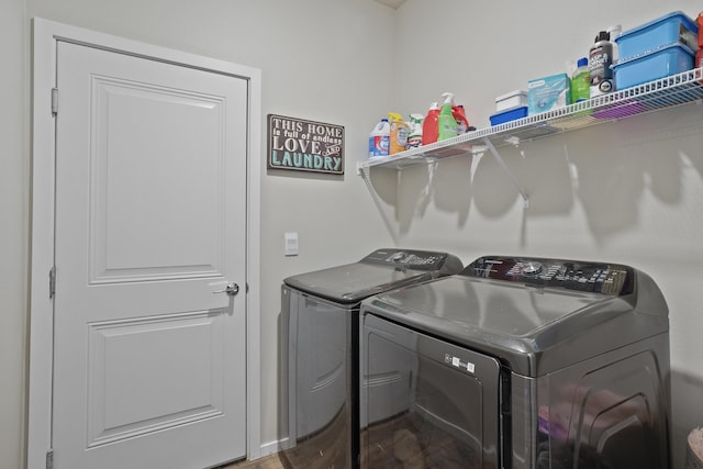 laundry room featuring washing machine and dryer