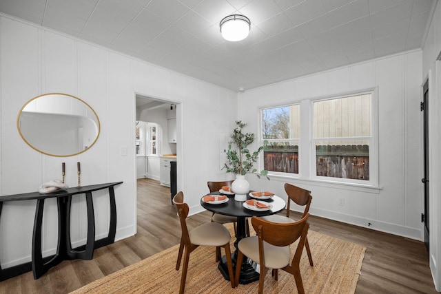 dining space featuring dark hardwood / wood-style floors