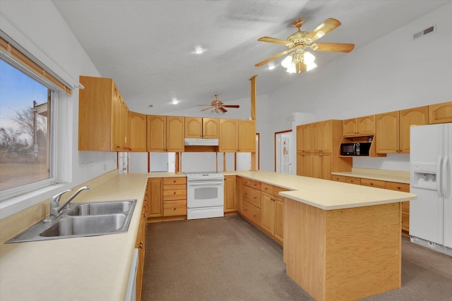 kitchen with white appliances, ceiling fan, sink, dark colored carpet, and high vaulted ceiling