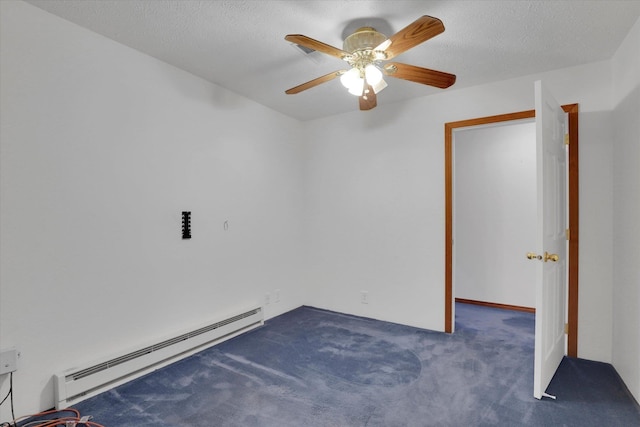 carpeted empty room featuring a textured ceiling, ceiling fan, and a baseboard heating unit