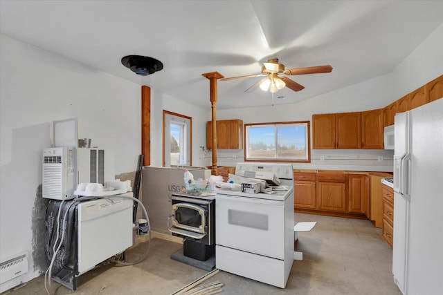 kitchen featuring ceiling fan and white appliances