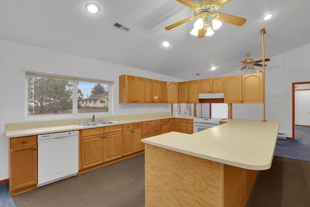 kitchen featuring white appliances, sink, ceiling fan, a textured ceiling, and kitchen peninsula