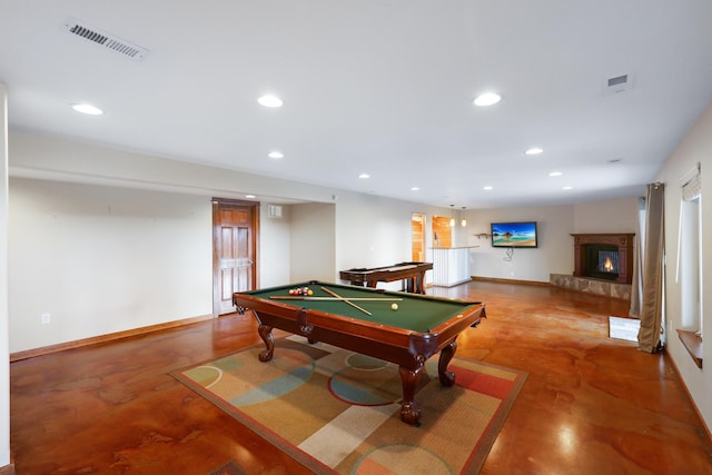 game room with pool table and concrete floors