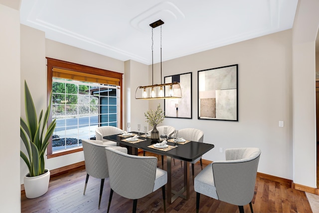 dining space featuring hardwood / wood-style floors