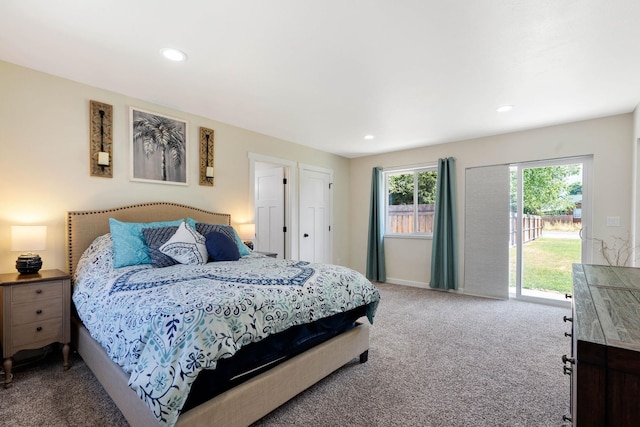 bedroom featuring access to outside and carpet flooring