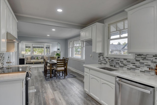 kitchen featuring white cabinetry, range with electric cooktop, and dishwasher